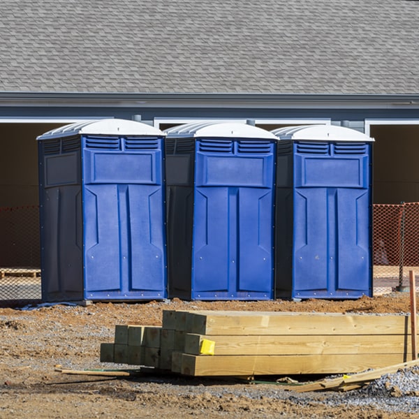 are there any additional fees associated with portable restroom delivery and pickup in Wilder
